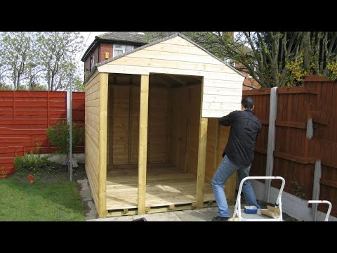 Man building a shed