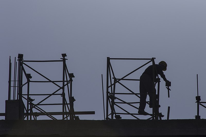 Construction worker on scaffolding