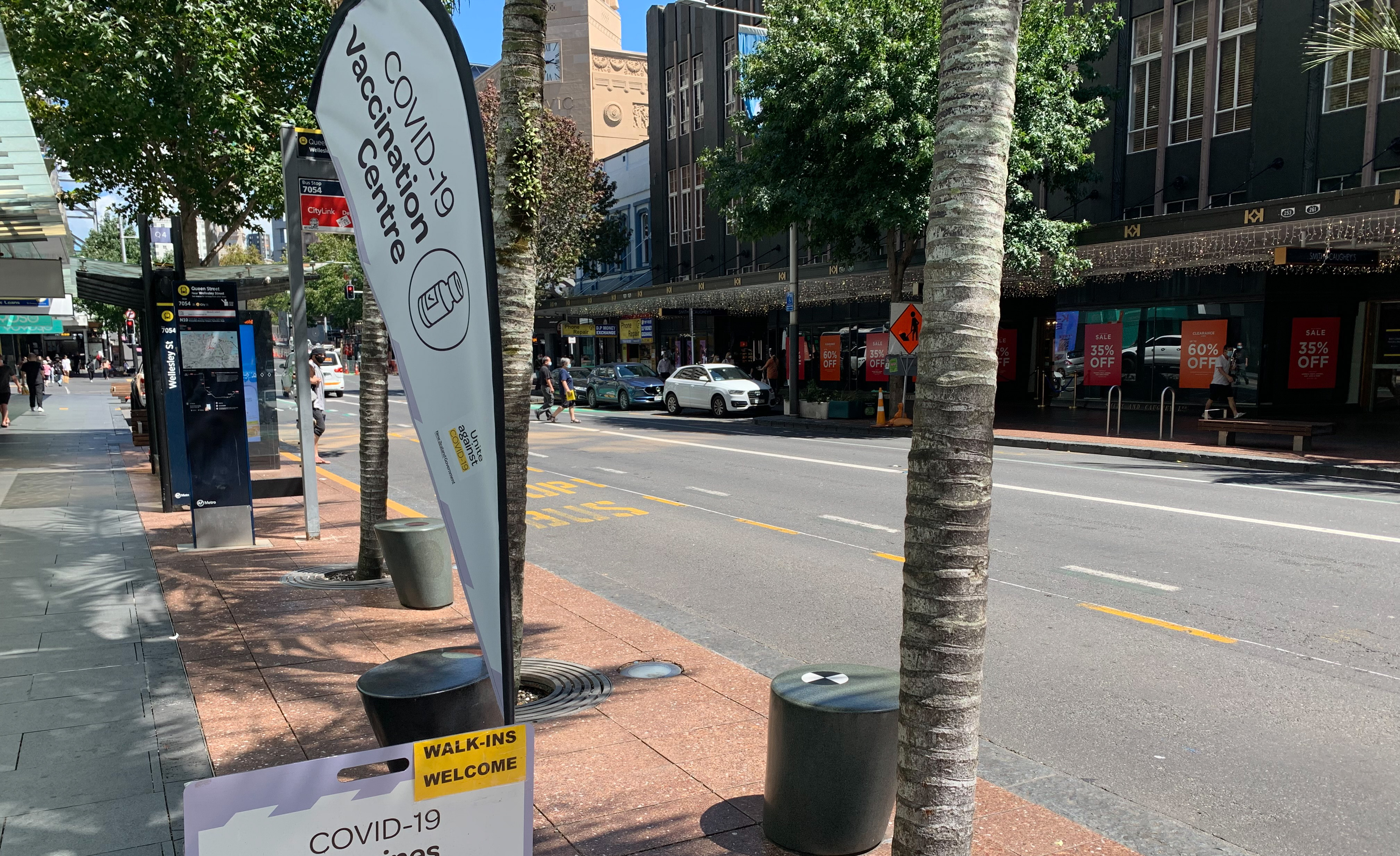 Covid vaccination sign and flag