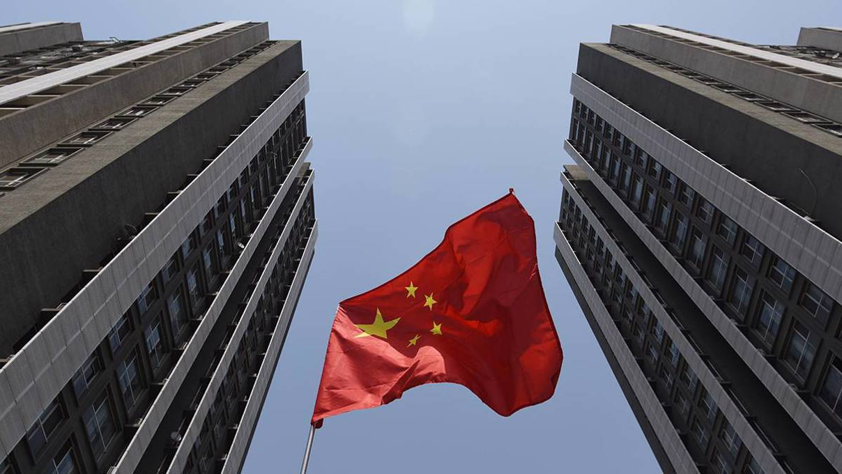 China flag between buildings