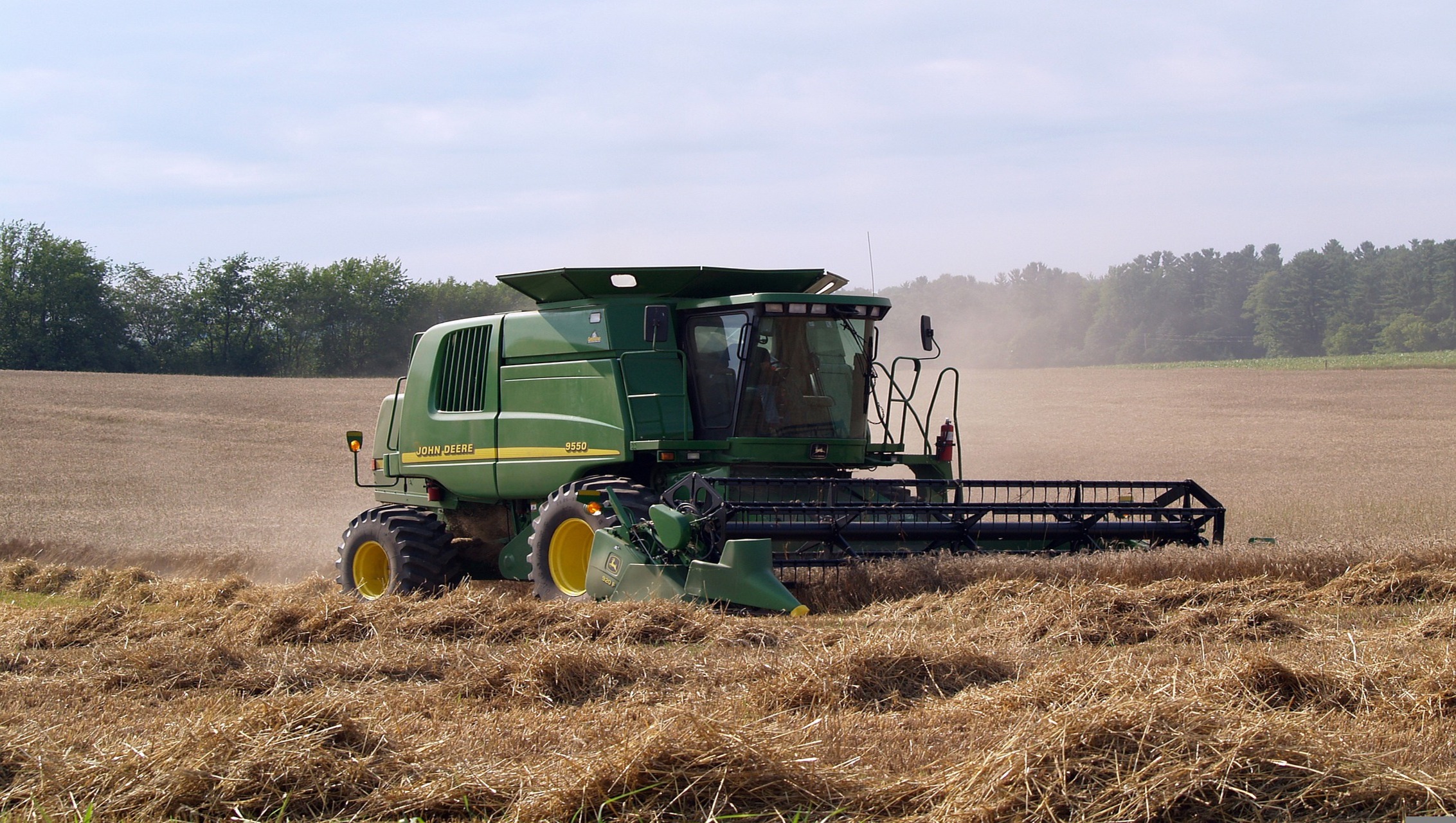 John Deere harvester in a field.