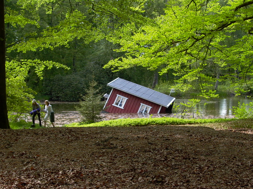 House sinking in water