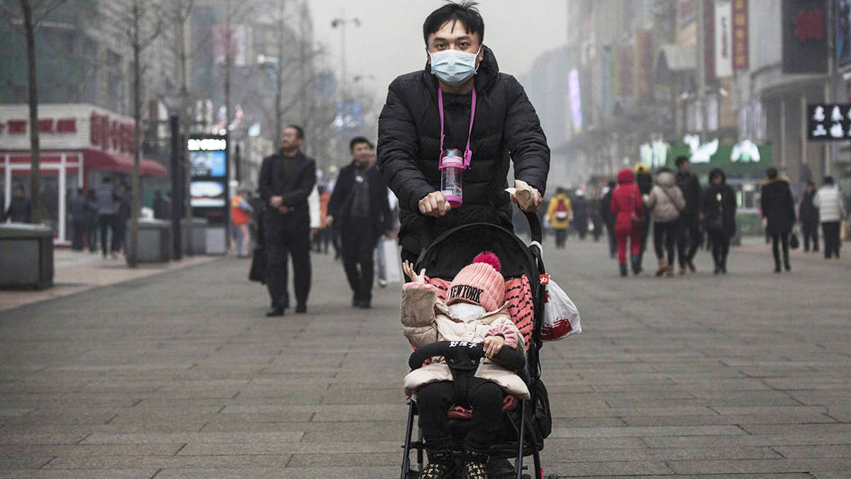 Lone family on Chinese street
