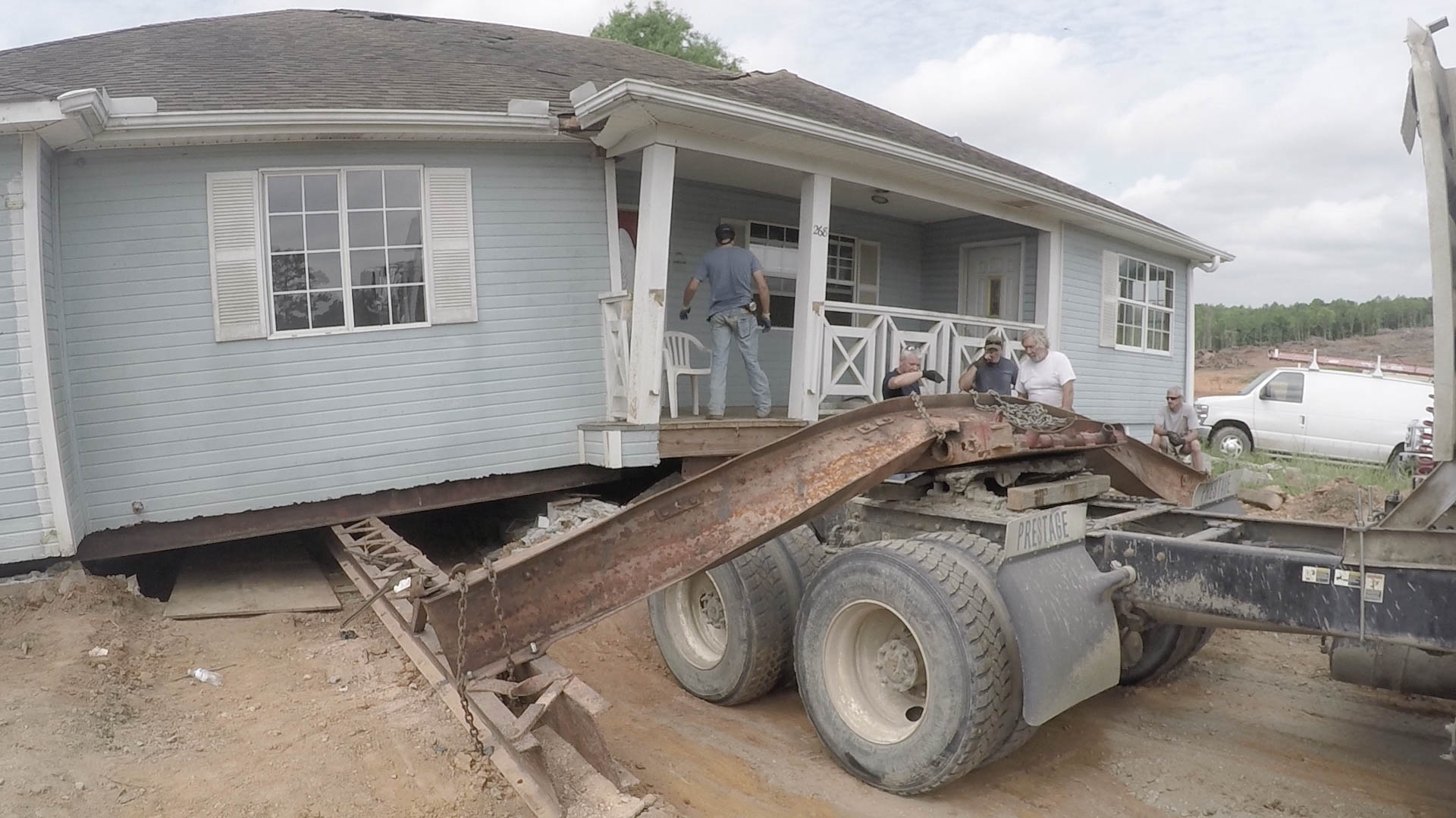 Broken house on trailer