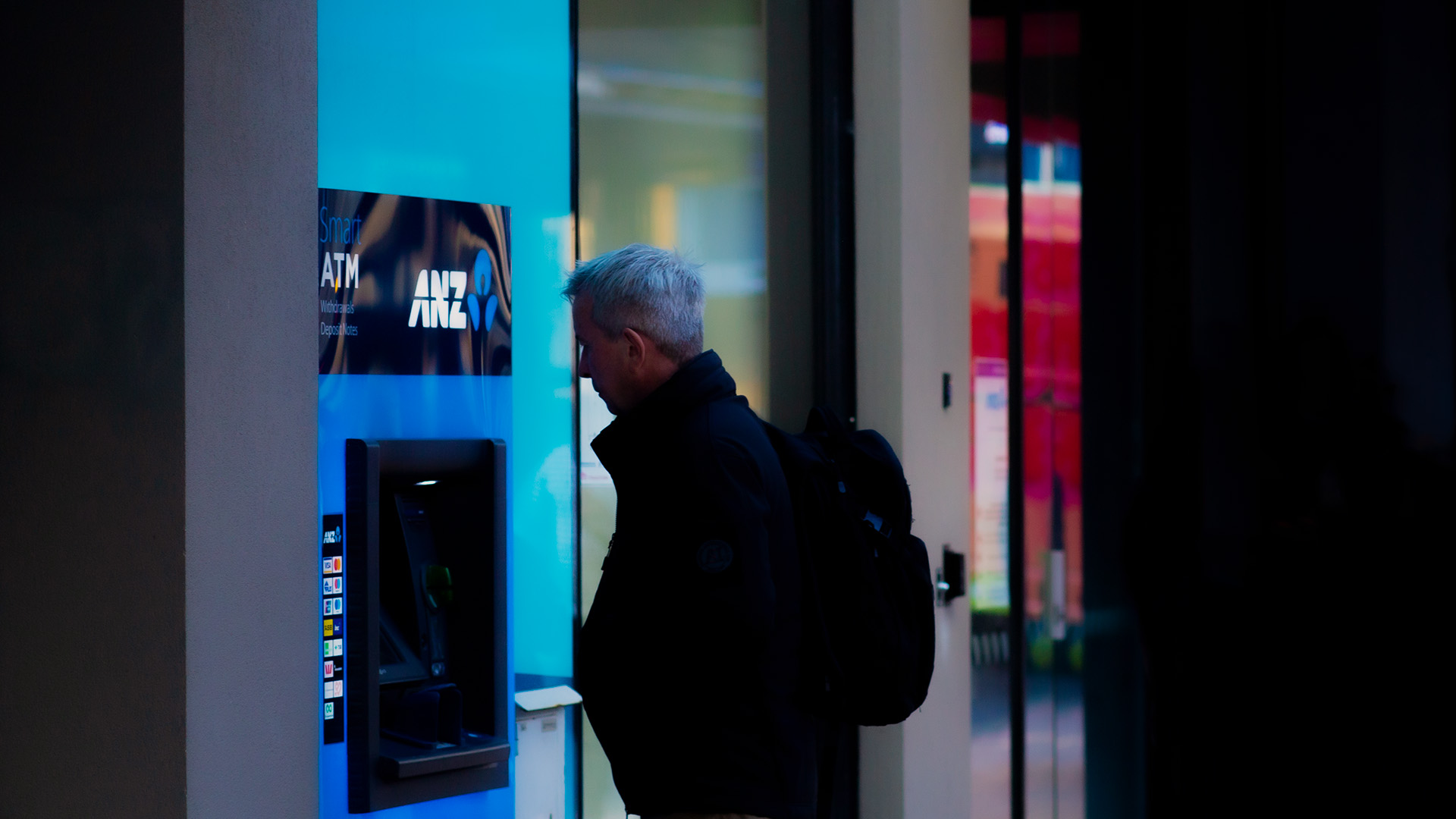 Man at an ANZ ATM machine 