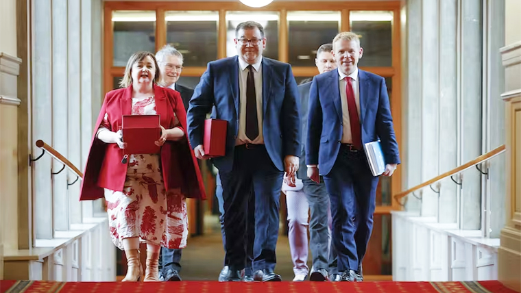 Senior cabinet minister Megan Woods, Minister of Finance Grant Robertson and Prime Minister Chris Hipkins prepare to deliver the May 18 budget.