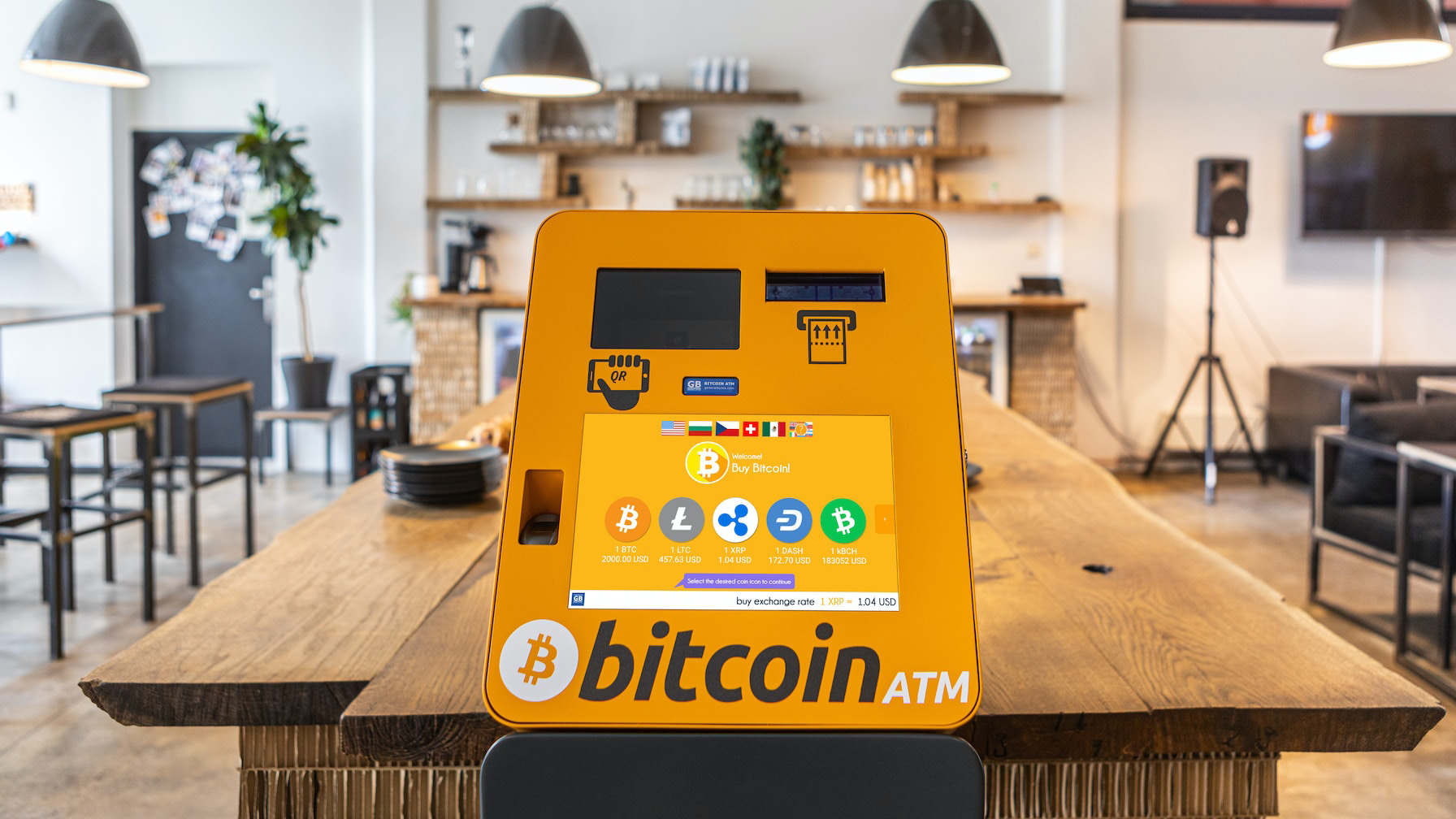 A photo of a bitcoin ATM in a cafe 