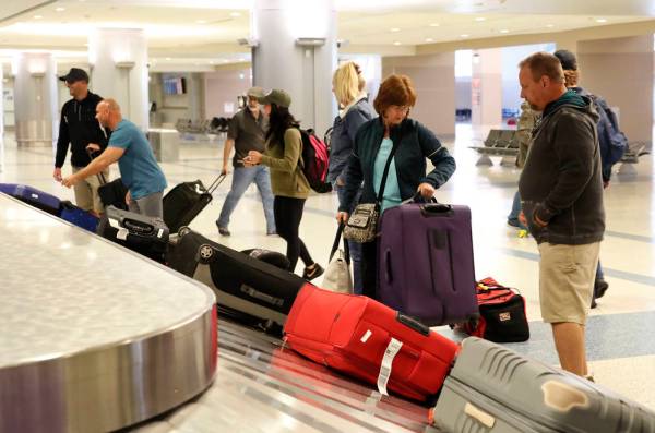 People at airport baggage claim