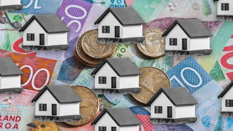 A composite image of New Zealand money overlayed with houses. 