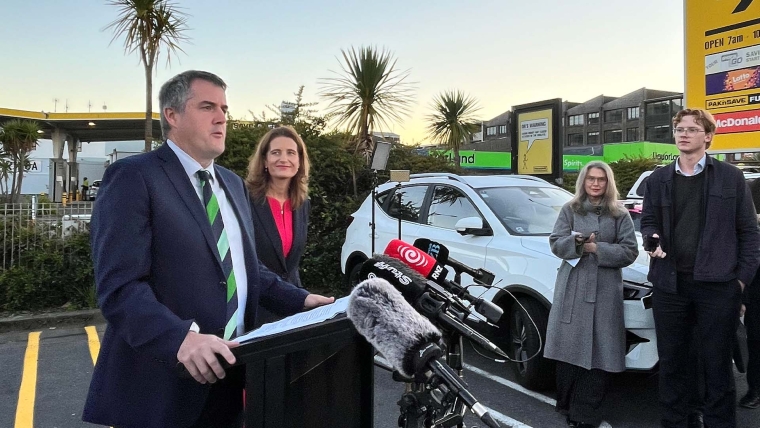 Chris Bishop and Nicola Willis speak to reporters about electric vehicle chargers.