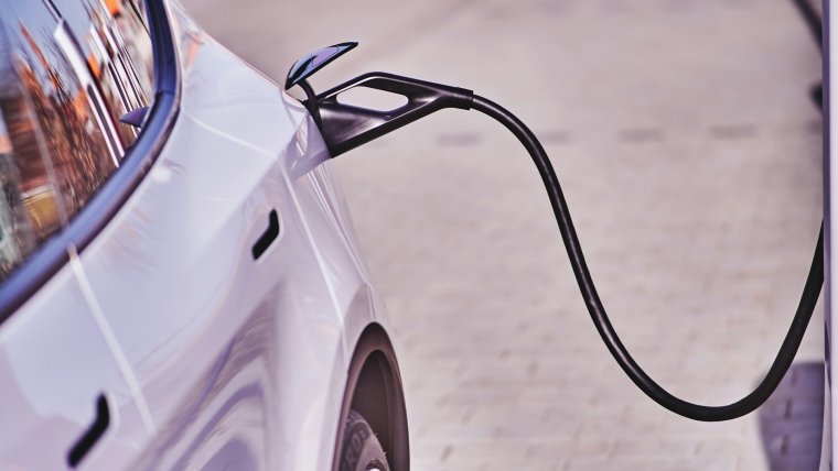 An electric vehicle being charged.