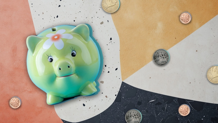 A composite image of an abstract background overlayed with a piggy bank and coins.