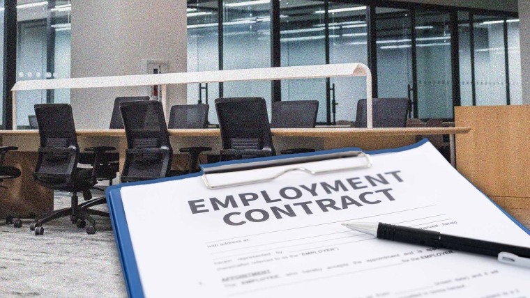A composite image of an office overlayed with an employment contract.