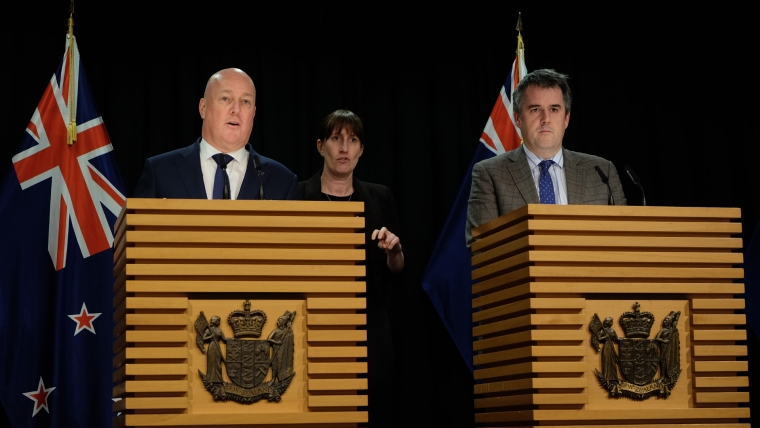 Prime Minister Christopher Luxon and Transport Minister Chris Bishop speak to reporters.