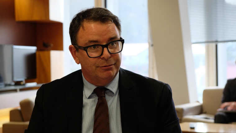 Commerce and Consumer Affairs Minister Cameron Brewer.