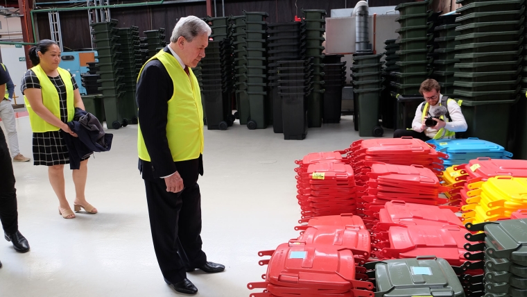 New Zealand First leader Winston Peters looks at wheelie bin lids. Image source: Mandy Te