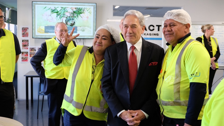New Zealand First leader Winston Peters takes photos with staff from Pact Packaging. Image source: Mandy Te