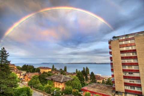 Rainbow over houses