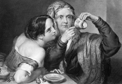 Two ladies reading tea leaves