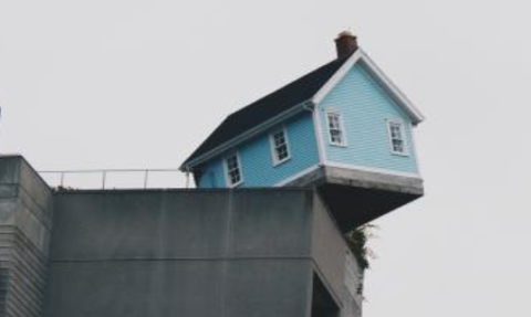House on the edge of a sharp drop