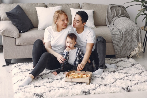 Family eating pizza