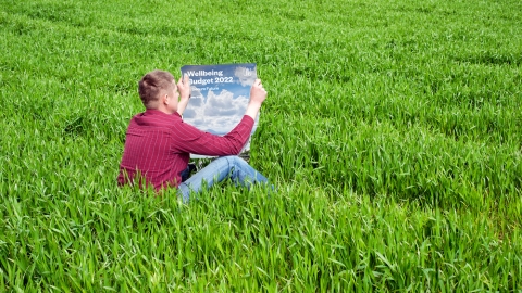 Farmer reading Budget 2022