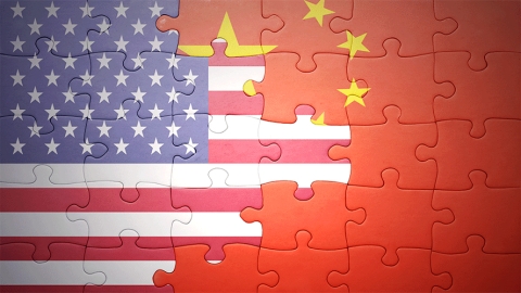 US China flags on puzzle