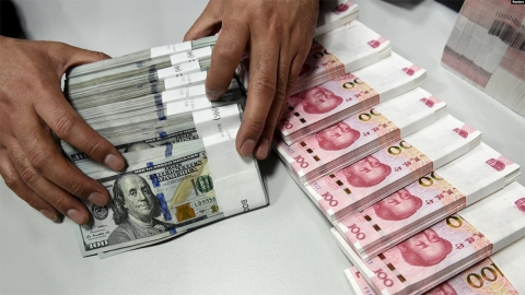 USD and yuan banknotes