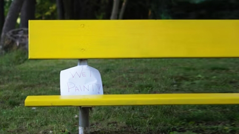 wet paint sign on bench