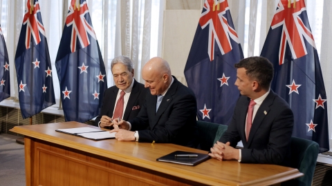 Winston Peters, Christopher Luxon, and David Seymour sign the coalition agreement