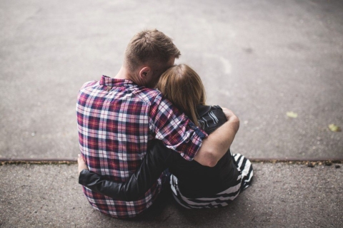 young couple embrace