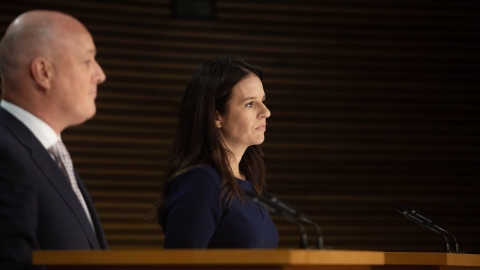 Prime Minister Christopher Luxon and Immigration Minister Erica Stanford at a press conference in the Beehive