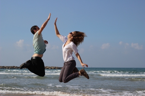 Couple jumping for joy