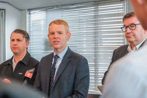 Transport and Auckland Minister Michael Wood (left), PM Chris Hipkins and Finance Minister Grant Robertson (right)
